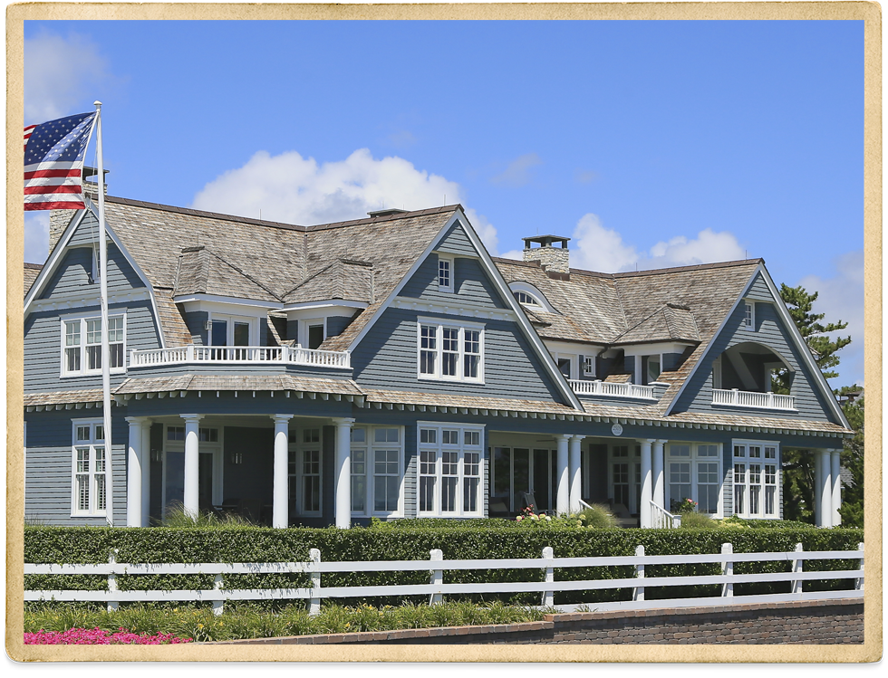 Blue-gray Two Story With White Trim And Fence