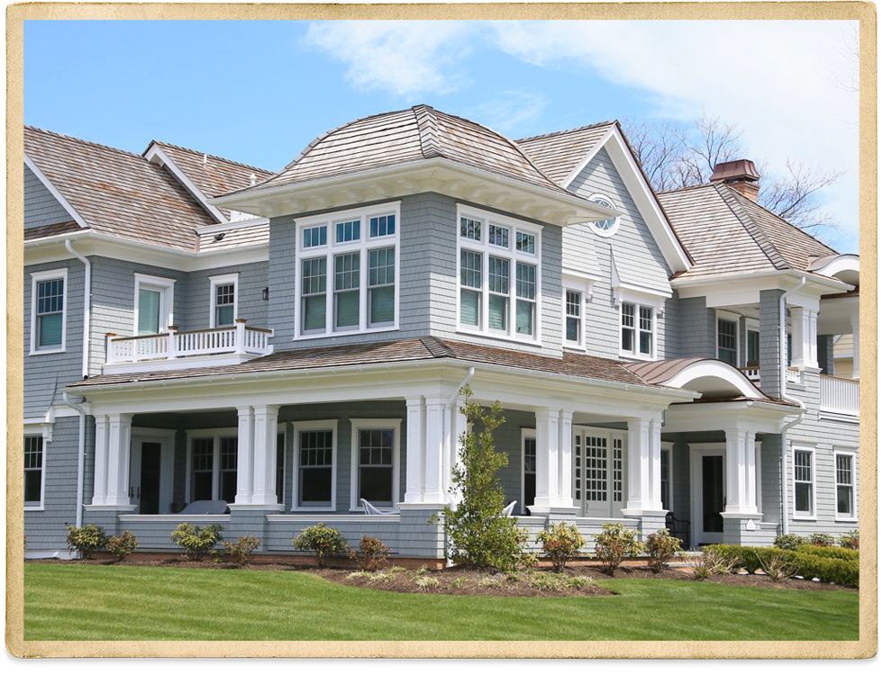 Large Light Gray Green Two Story With White Trim