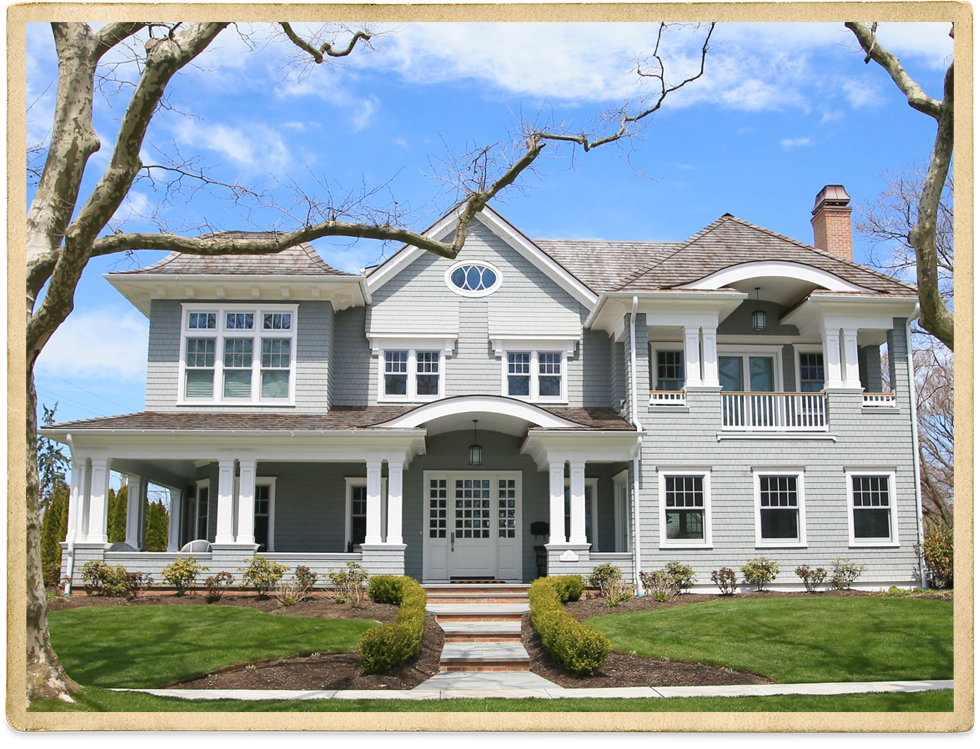 Large Light Gray Green Two Story With White Trim